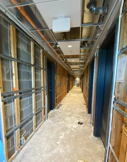 Containment barrier and negative air machine on a remediation job